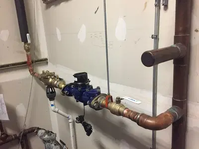 M & E Plumbing Service Inc