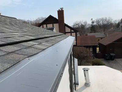 Dennison Exterior Solutions & Gutter Topper