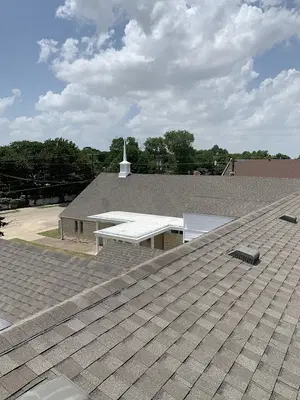 Peaked Roofing of Flower Mound
