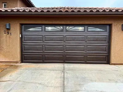 Big Hands Brown Garage Door Supply